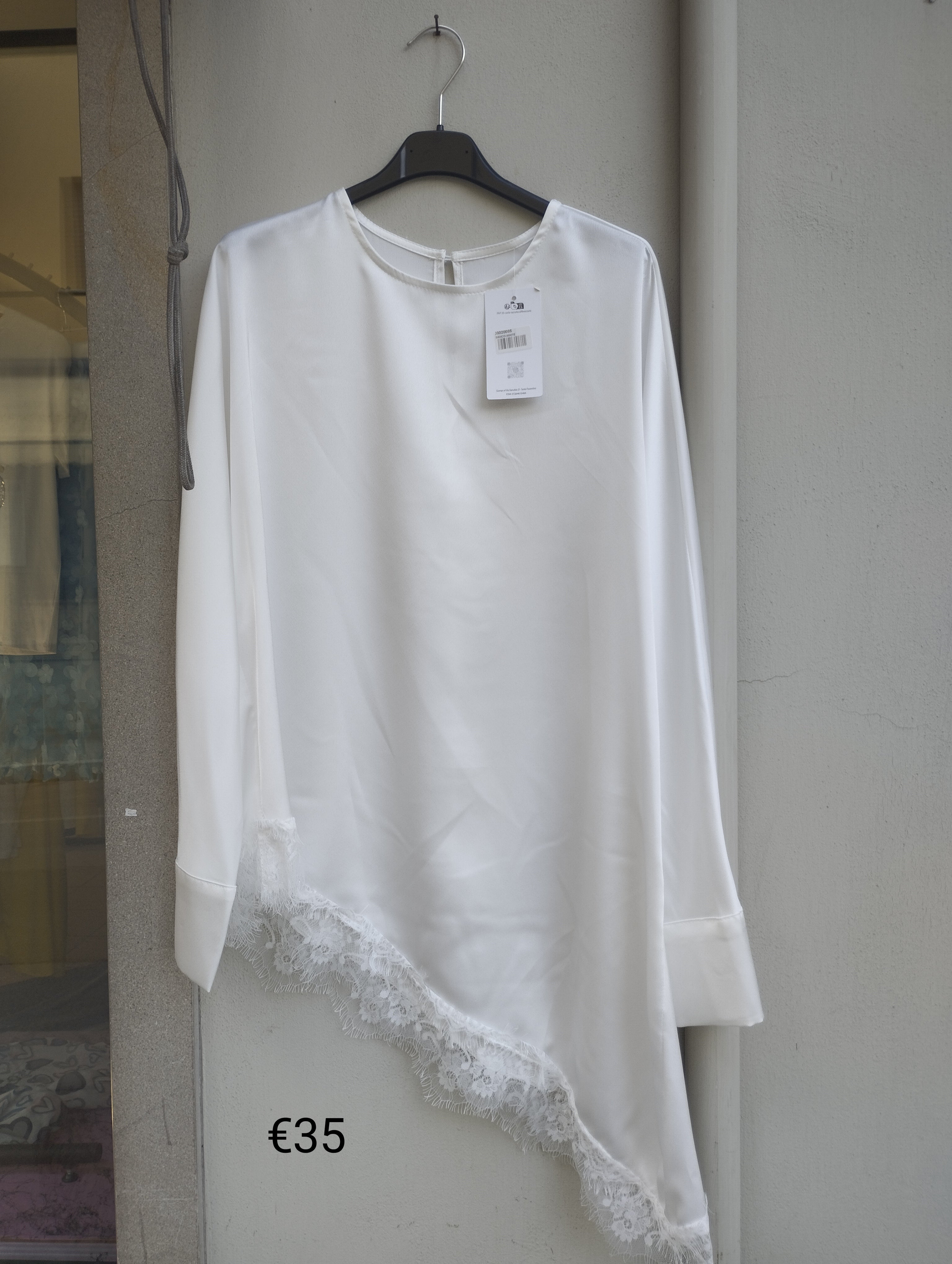 Blusa asimmetrica